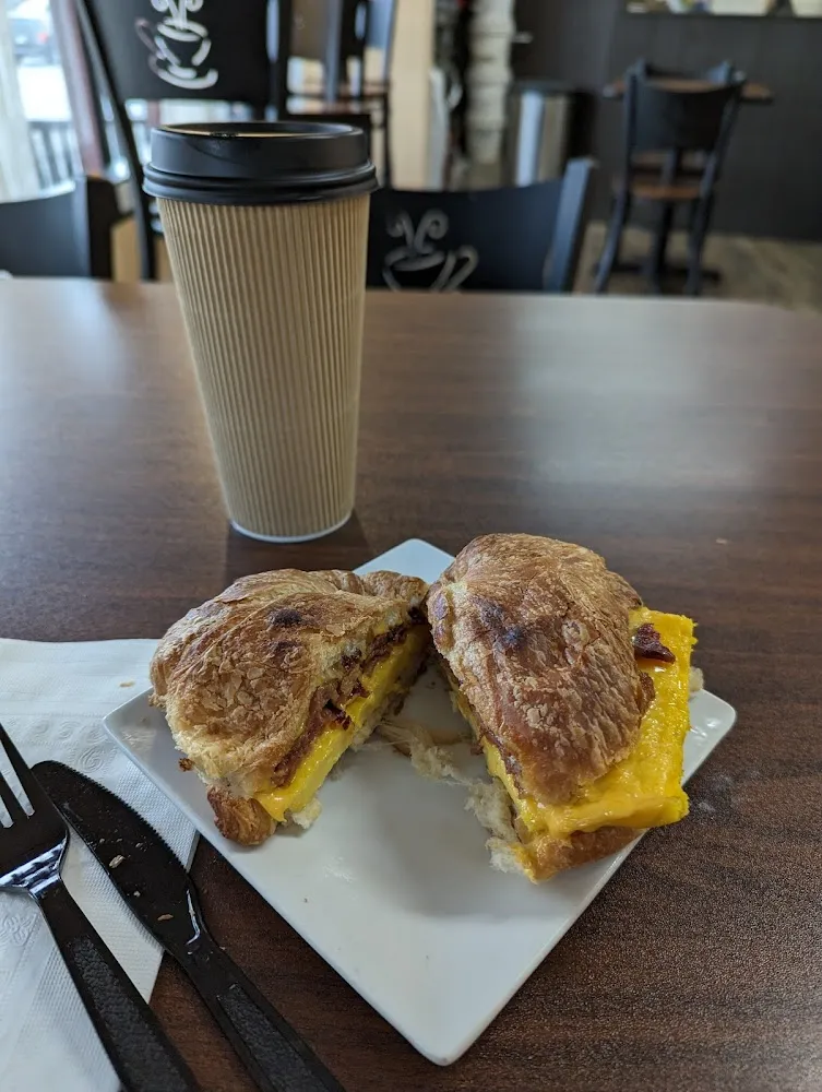 Bacon Egg and Cheese Croissant with a Vanilla Latte